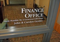 Donor names are stenciled on each office window. Donor names are stenciled on each office window.